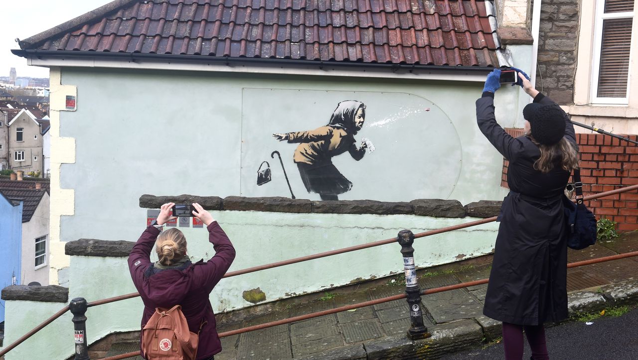 Banksys Foto in Bristol steigt nach Hause in Großbritannien