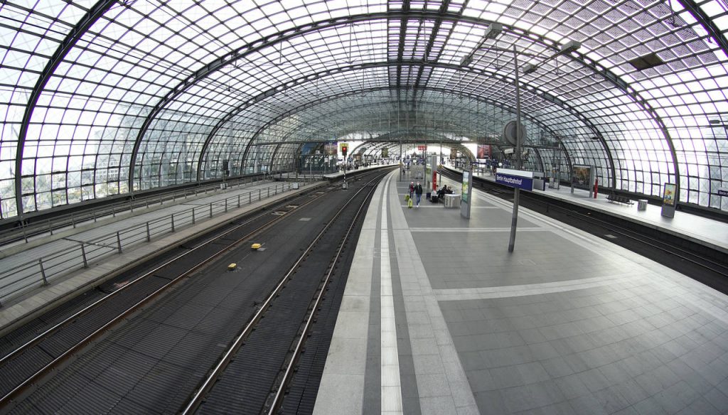 Traveller walk on an empty station platform at the main station in Berlin, Germany, Thursday, Sept....