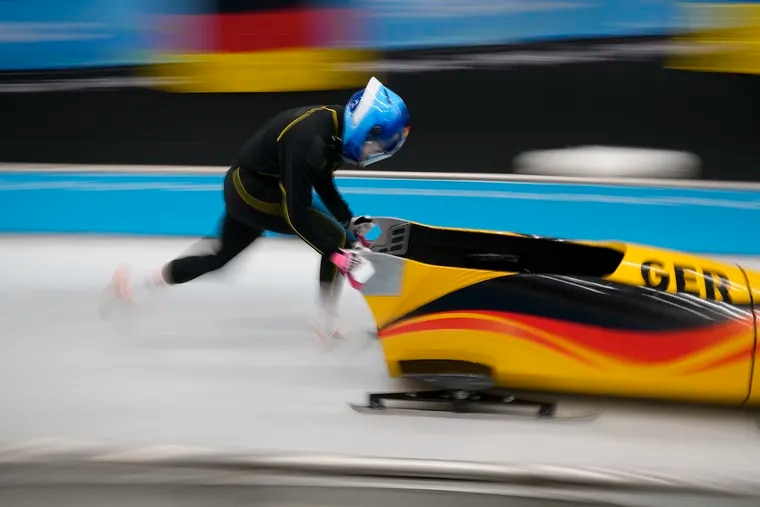 Laura Nolte of Germany starts during a women's monobob training heat at the 2022 Winter Olympics.