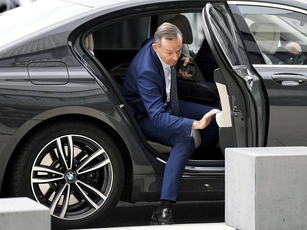 Volker Wissing, now Federal Minister for Digital Affairs and Transport, arrives in a BMW car in Berlin, Germany, Thursday, Oct. 21, 2021. (AP Photo/Michael Sohn, File)